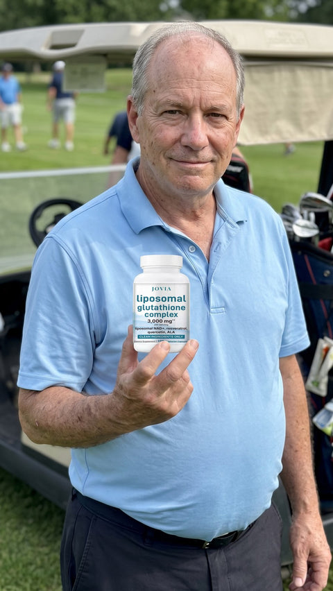 Man holding Jovia Liposomal Glutathione Complex